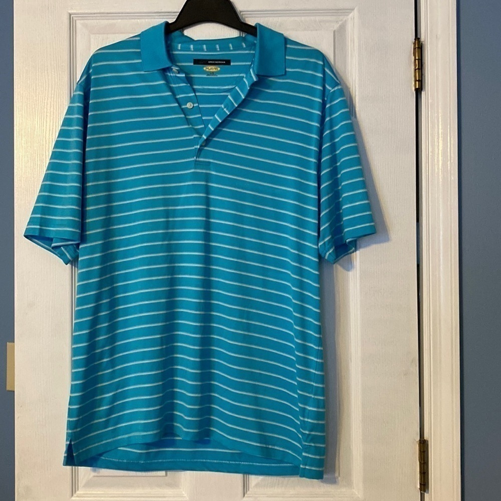 𝅺greg Norman mens polo; size XL